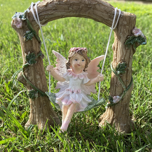 Beautiful Fairy on a Swing