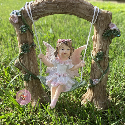 Beautiful Fairy on a Swing