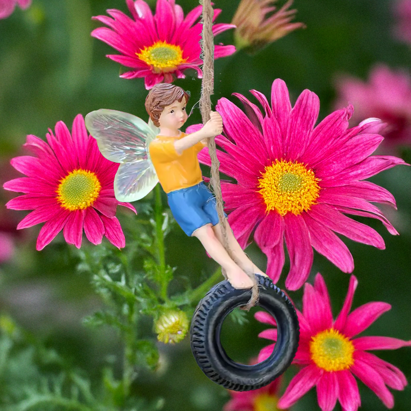 Boy Fairy Swinging on a Tyre