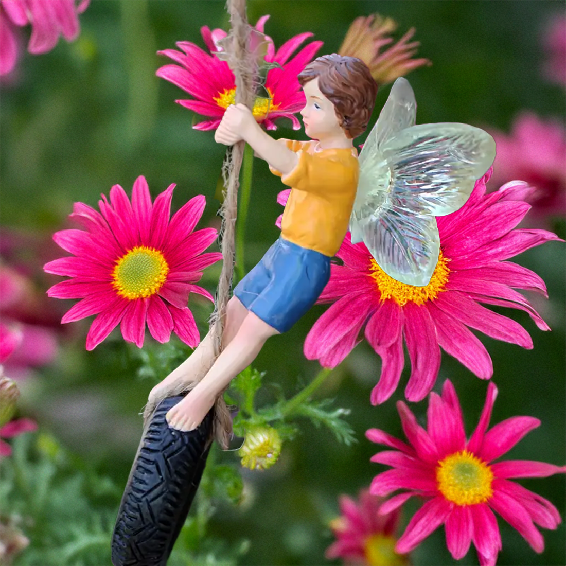 Boy Fairy Swinging on a Tyre