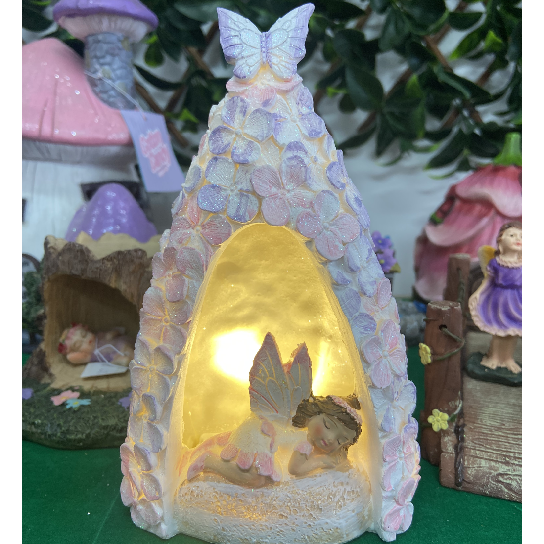 Fairy in a Light Up Pink and Purple Floral Cave