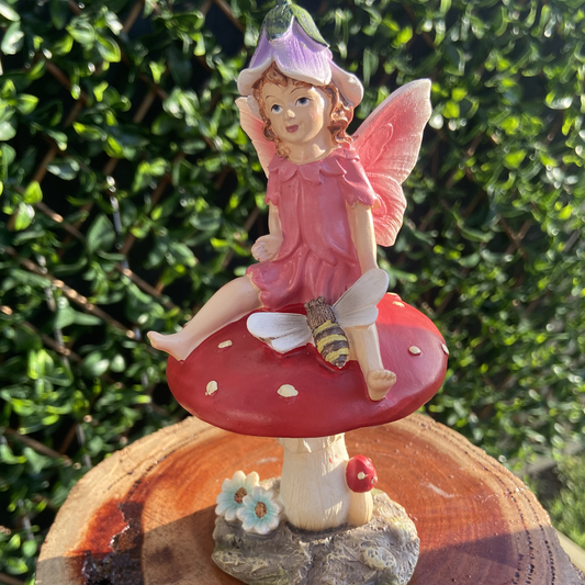 Fairy Pixie Figurine Sitting on Mushroom with a Bee